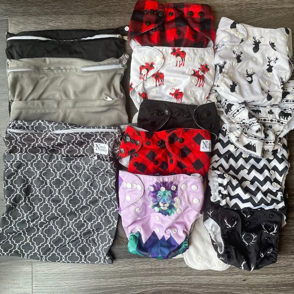 REUSABLE/ ADJUSTABLE BABY DIAPERS: 9 Cloth Diapers And 3 Diaper Bag